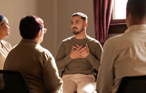 A group discussing anger management therapy benefits