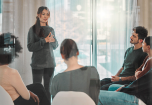 A group of people discuss intensive outpatient program benefits
